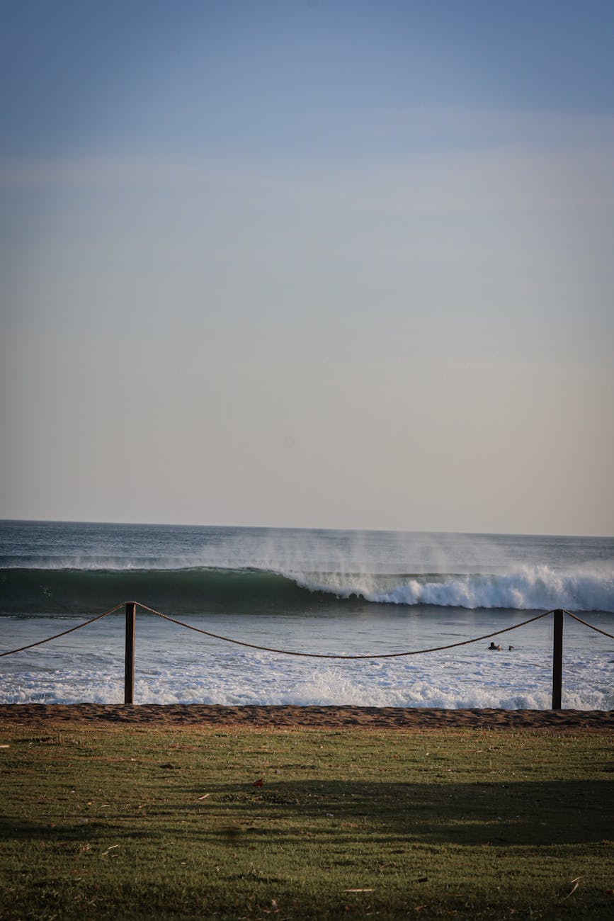 seascape with waves and a rope fence on the coast