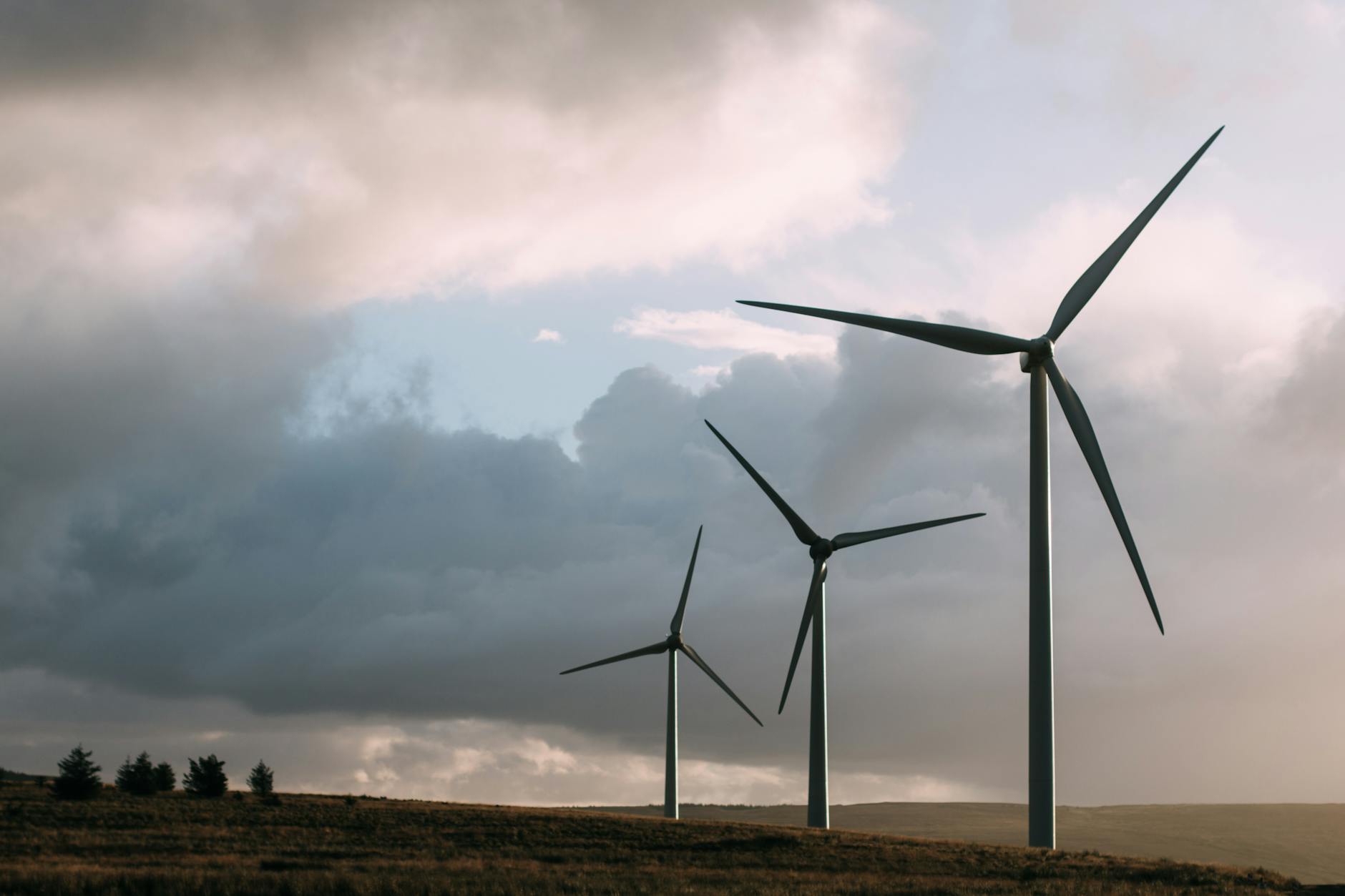 three gray wind turbine